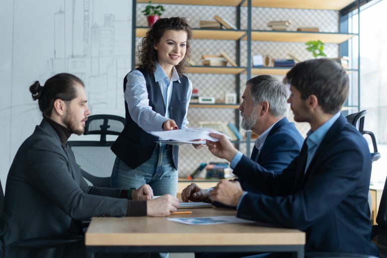 Newly promoted manager leading a meeting with former peers